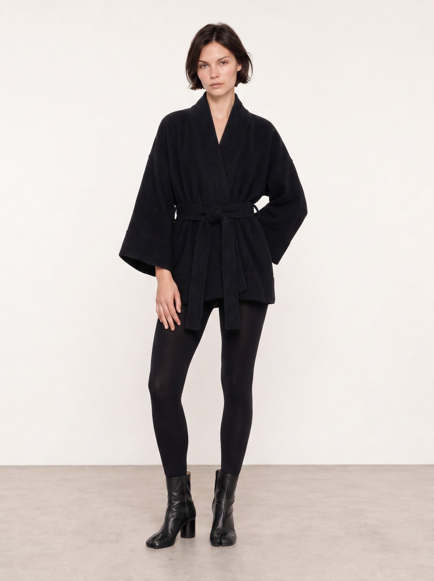 A front shot of a model wearing a pure Wool kimono jacket made by Atelier Mizuni