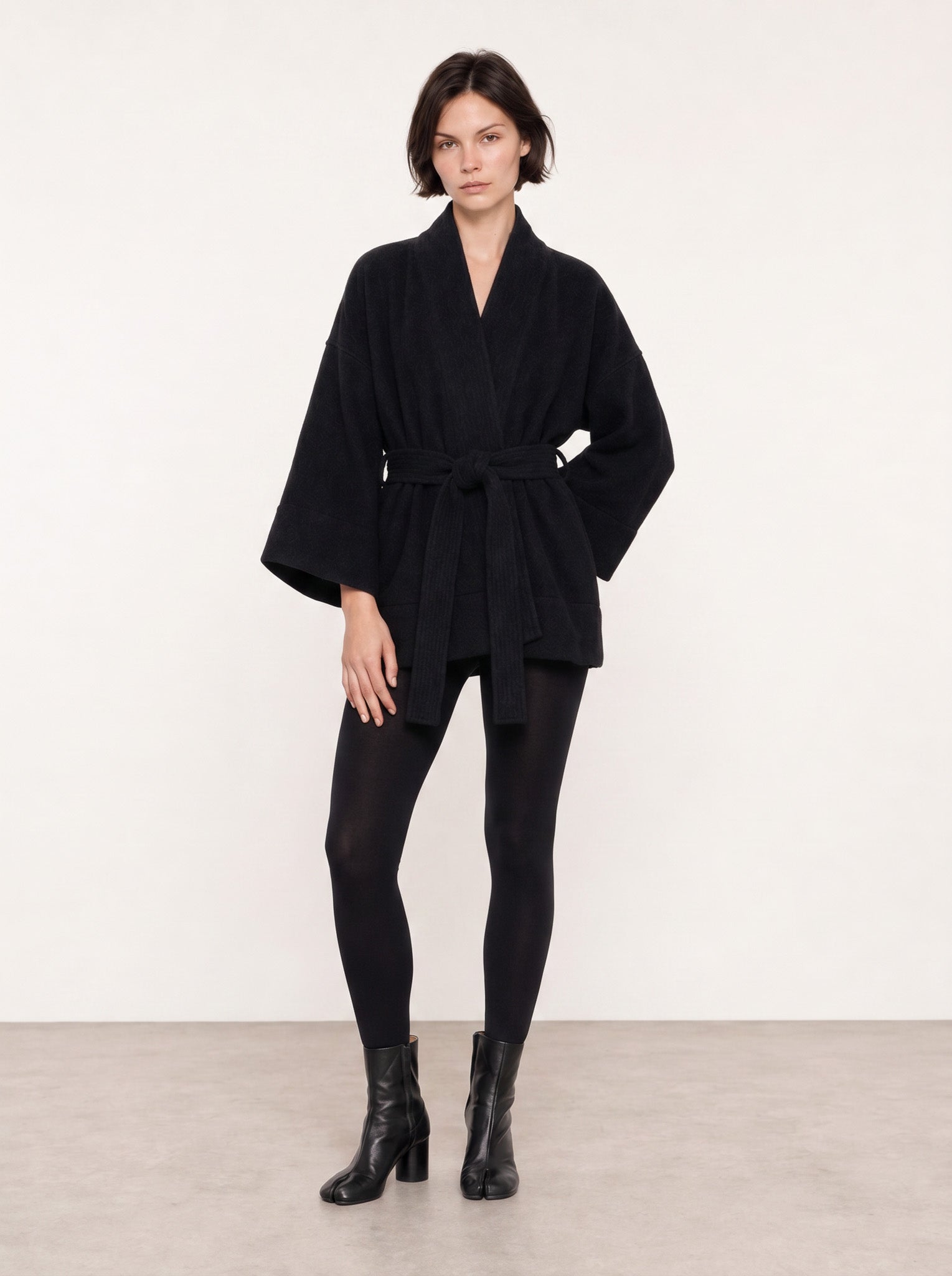 A front shot of a model wearing a pure Wool kimono jacket made by Atelier Mizuni