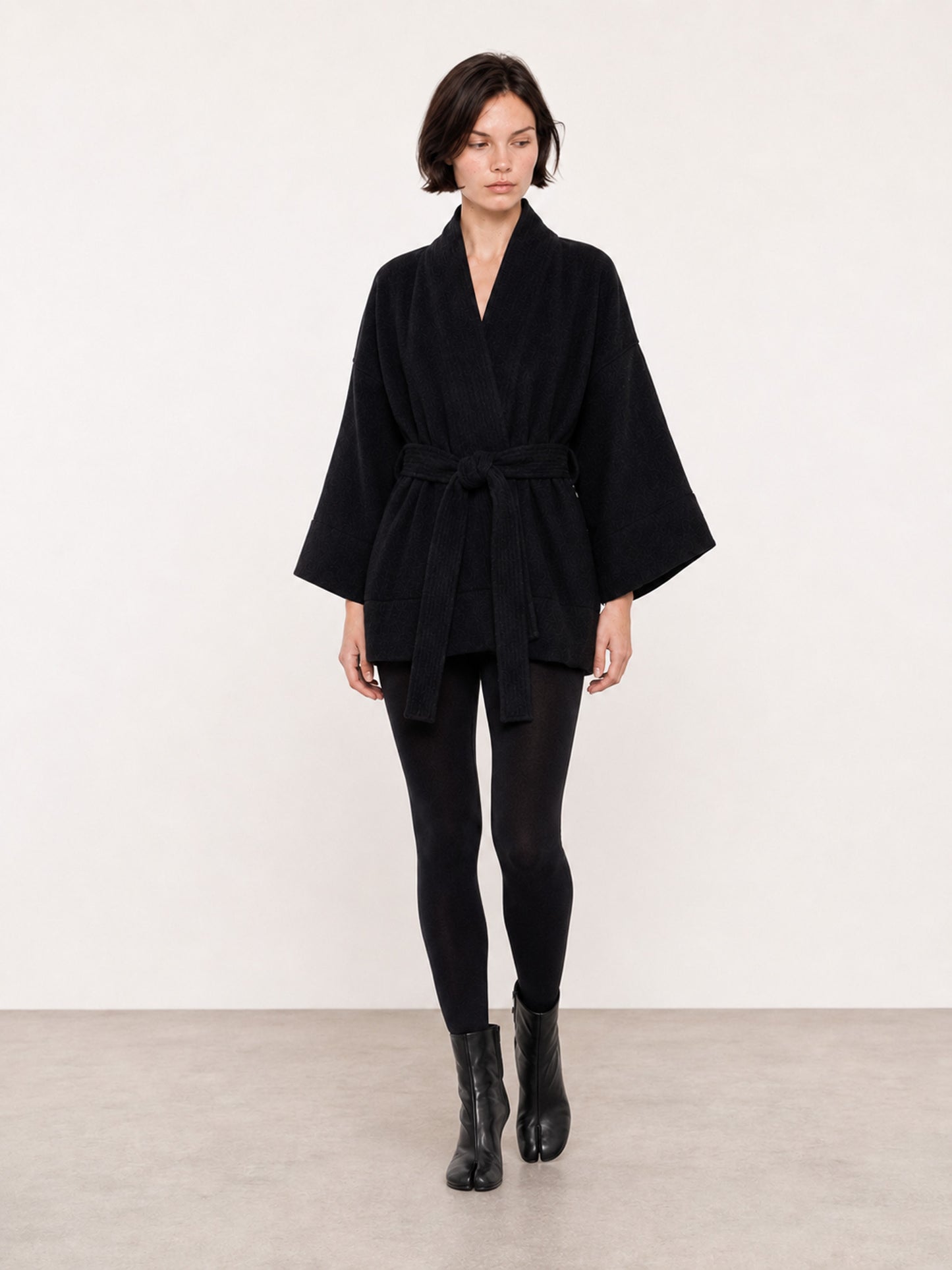 A front shot of a model wearing a pure Wool kimono jacket made by Atelier Mizuni
